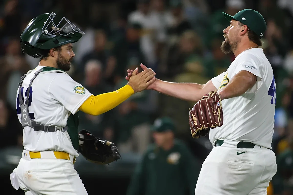 Langeliers, Wilson hit HRs as Athletics beat Rangers 6-5, sit atop AL West for 1st time since 2021