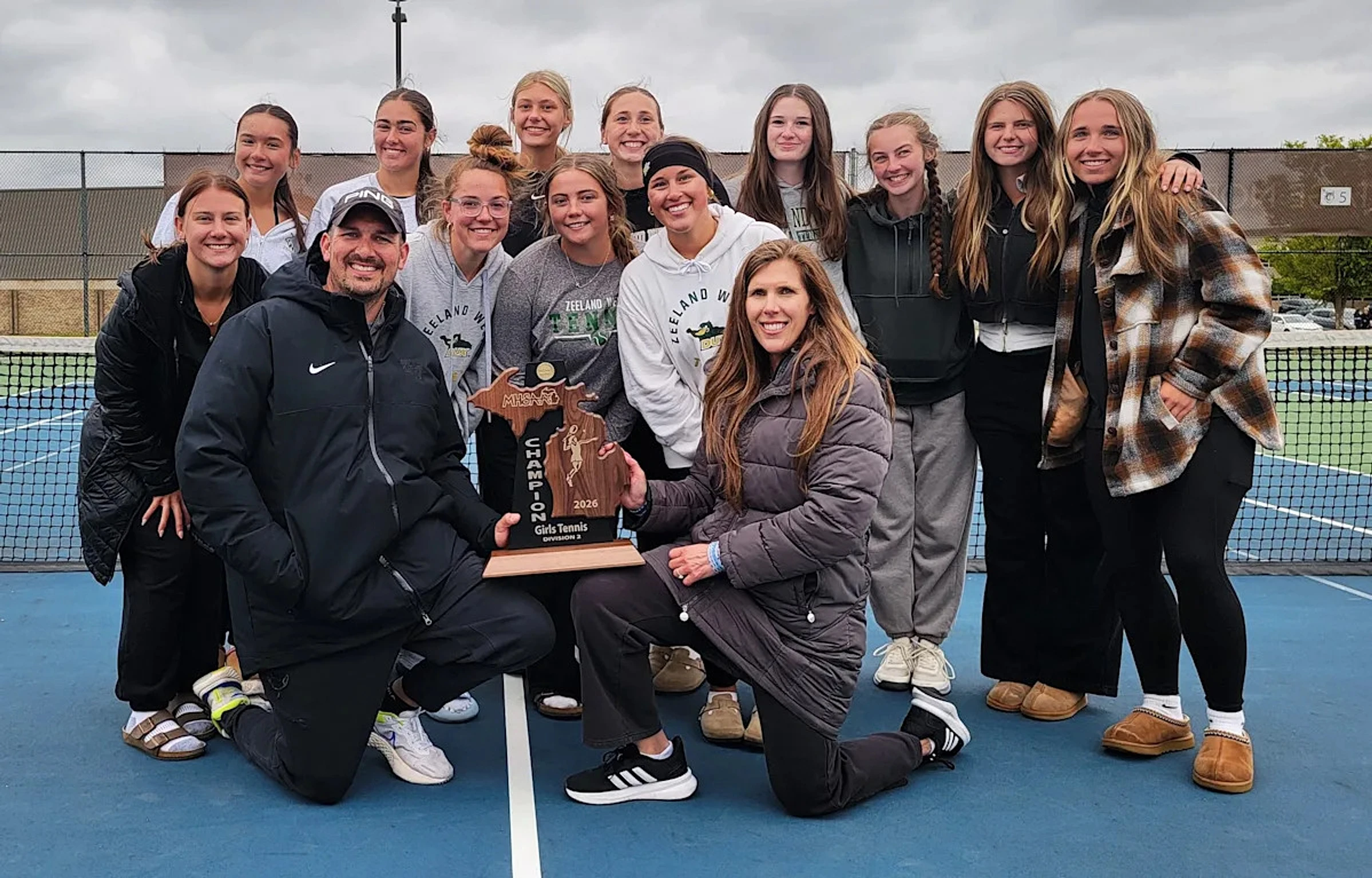 Zeeland West claims first ever girls tennis regional title in thrilling fashion