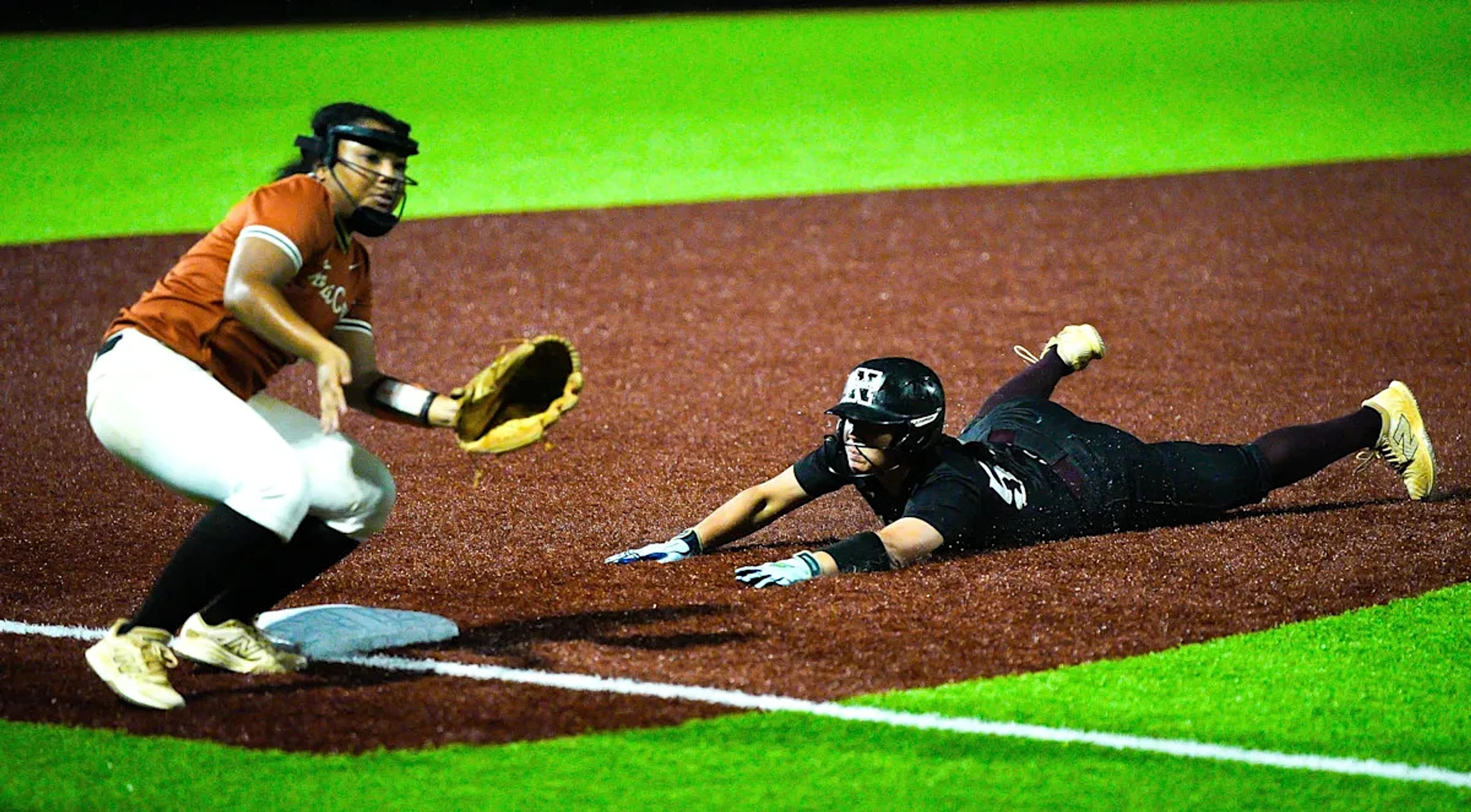 Navarre softball wins wild two-day game to reach regional final